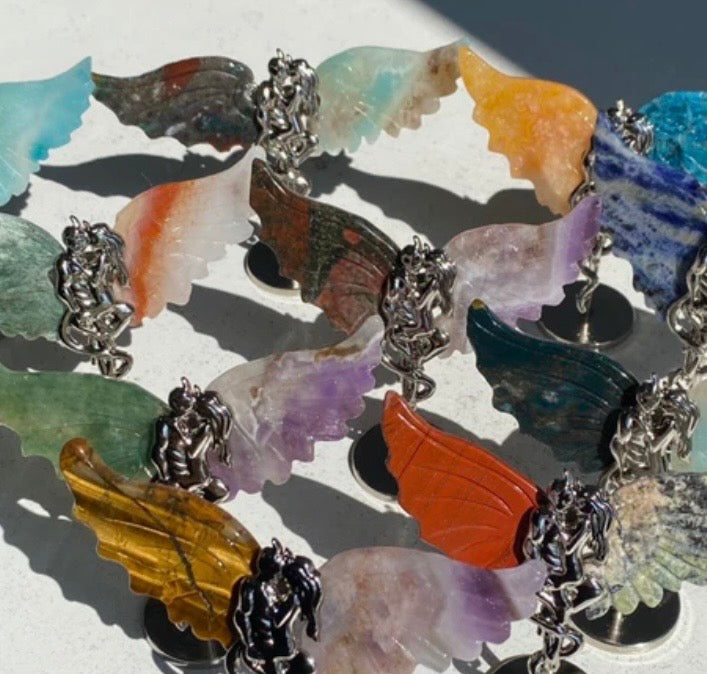 Duality of Wings: Mystery Crystal Wing Carvings